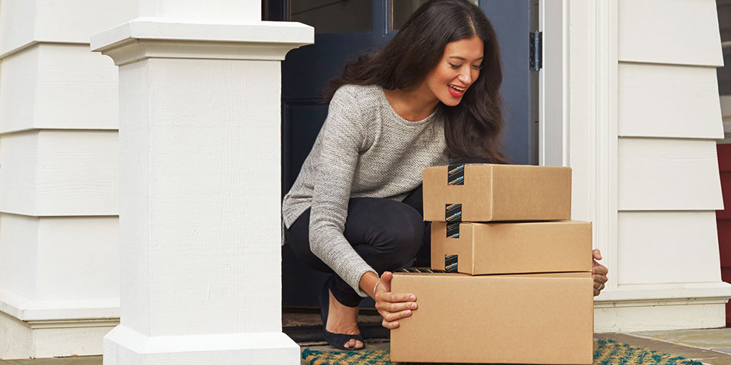 woman-picking-up-amazon-parcel woman-picking-up-amazon-parcel